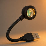 Primer plano del lente, cuello flexible y conector USB de la lámpara Lumé